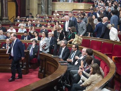 The opposition walks out of parliament in protest on Thursday.