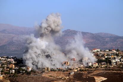 A column of smoke rises following an Israeli airstrike on the village of Khiam, near the border in southern Lebanon.