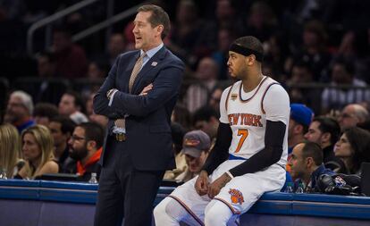 Jeff Hornacek y Carmelo Anthony.