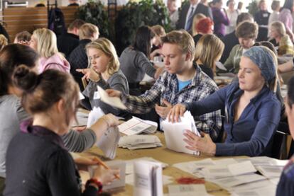 Votes are counted at a polling center in Helsinki on Sunday after parliamentary elections.