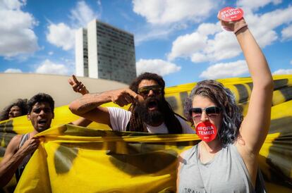 Supporters of Dilma Rousseff stage a protest.