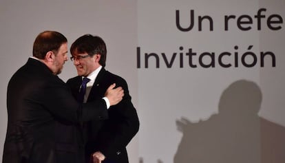 El president de la Generalitat, Carles Puigdemont, junt amb Oriol Junqueras.