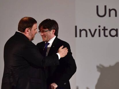 El president de la Generalitat, Carles Puigdemont, junt amb Oriol Junqueras.