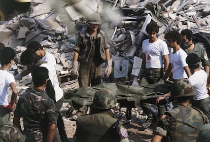 American Marines searching for survivors and bodies after a Hezbollah suicide car bomber destroyed the US base in Beirut in 1983.