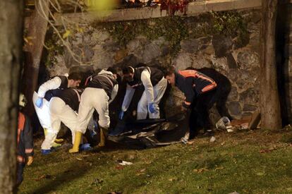 Forensic officials work at the scene of explosions near the Besiktas football club stadium after attacks in Istanbul, late Saturday, Dec. 10, 2016. Two explosions struck Saturday night outside a major soccer stadium in Istanbul after fans had gone home, an attack that wounded about 20 police officers, Turkish authorities said. Turkish authorities have banned distribution of images relating to the Istanbul explosions within Turkey.(Ismail Coskun, IHA via AP)
