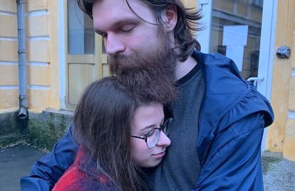 Ilia Samoilenko hugs his girlfriend, Dariia Tsikunova, at a hospital in Chernihiv after being released by Russian forces.