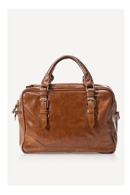 Este bolso es una compra segura, ya que, el camel te permite cualquier combinación. Es de Massimo Dutti (145 euros).