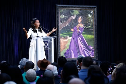 Oprah Winfrey speaks on stage after her portrait was unveiled at the Smithsonian's National Portrait Gallery in Washington, D.C., on December 13, 2023.