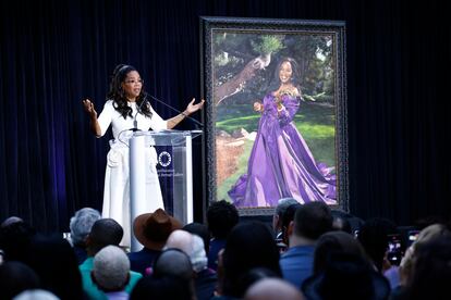 Oprah Winfrey speaks on stage after her portrait was unveiled at the Smithsonian's National Portrait Gallery in Washington, D.C., on December 13, 2023.