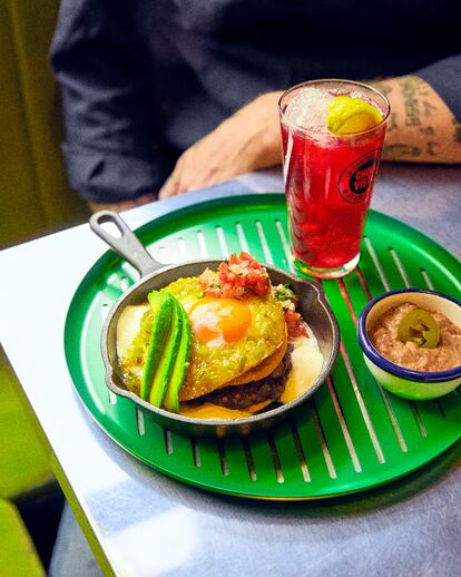 Huevos rancheros with Jamaican water.