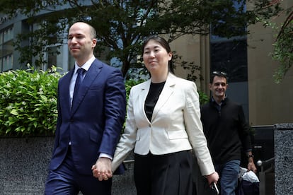 Greg Brockman, presidente de OpenAI, junto a su esposa