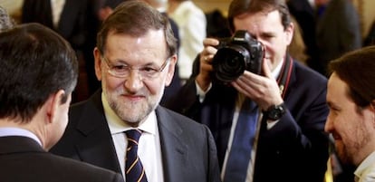 Mariano Rajoy, amb Pablo Iglesias i Andrés Herzog.