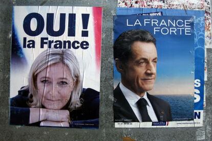 Dos carteles de campaña a favor de Marine Le Pen y Nicolas Sarkozy.