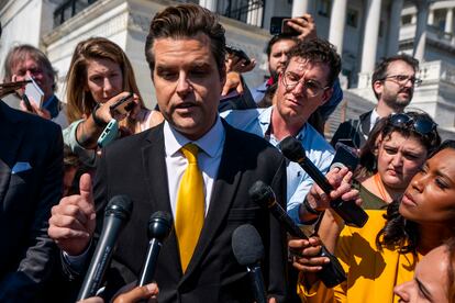Republican Representative from Florida Matt Gaetz (C) responds to a question from the news media during a press briefing outside the US Capitol in Washington, DC, USA, 02 October 2023.