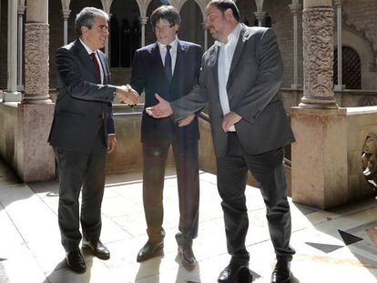 Homs, Puigdemont y Junqueras, este jueves en la Generalitat.  