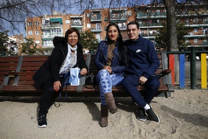 In Entrevías, it is common to see migrants and Spaniards form couples. Spaniard Borja Cayuela, 28, his Ecuadorian girlfriend Estefany Pinto, 30, and her mother, Olga Morocho, 55, pose for a photo.