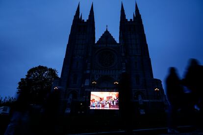 A video screen is set up ahead of a vigil for the victims of Wednesday's mass shootings, Sunday, Oct. 29, 2023