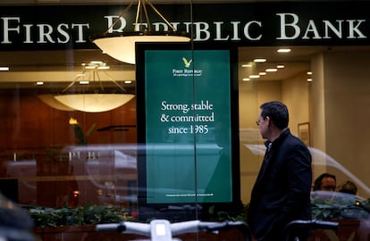 A person walks past a First Republic Bank branch