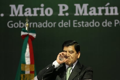 Mario Marín, durante una conferencia cuando era gobernador de Puebla.