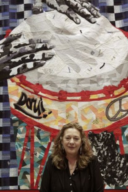 Pilar Manjón, pictured with the quilt created using clothes that belonged to her son, who died in the 11-M attacks.