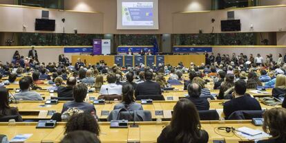 Junqueras, Puigdemont y Romeva, durante la conferencia en las instalaciones del Parlamento Europeo.