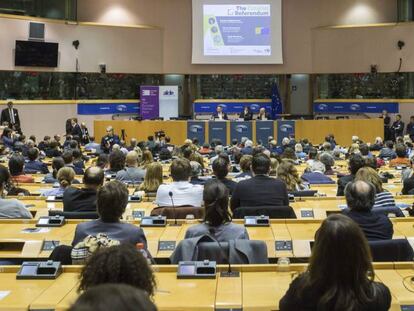 Junqueras, Puigdemont y Romeva, durante la conferencia en las instalaciones del Parlamento Europeo.