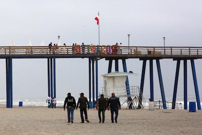 Mexican law enforcement officers walk along the beach, following the disappearance of two Australian tourists and one American tourist in Baja California, in Rosarito, Mexico May 2, 2024