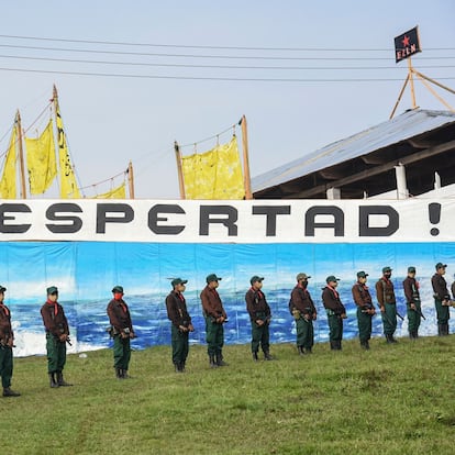 Members of the Zapatista Army of National Liberation (EZLN) former guerrilla army take part in a farewell ceremony for a seven-member delegation that leaves for Europe to meet with anti-capitalist groups in 30 different countries, in Caracol de Morelia, Altamirano, Chiapas State, Mexico, on April 26, 2021. (Photo by Isaac GUZMAN / AFP)