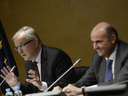 EU economic affairs commissioner Olli Rehn at a news conference in Madrid last month with Spanish Economy Minister Luis de Guindos.