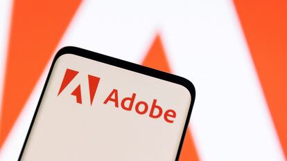 Adobe logo is seen on smartphone in this illustration taken June 13, 2022.