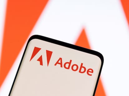 Adobe logo is seen on smartphone in this illustration taken June 13, 2022.