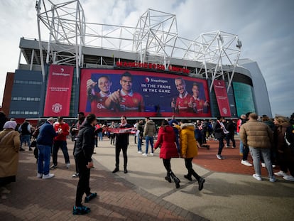 Fans outside the Old Trafford stadium in Manchester ahead the English Premier League soccer match between Manchester United and Southampton, England, Sunday, March 12, 2023.