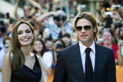 Angelina Jolie y Brad Pitt llegan al estreno el viernes de <i>Moneyball</i> en Toronto.