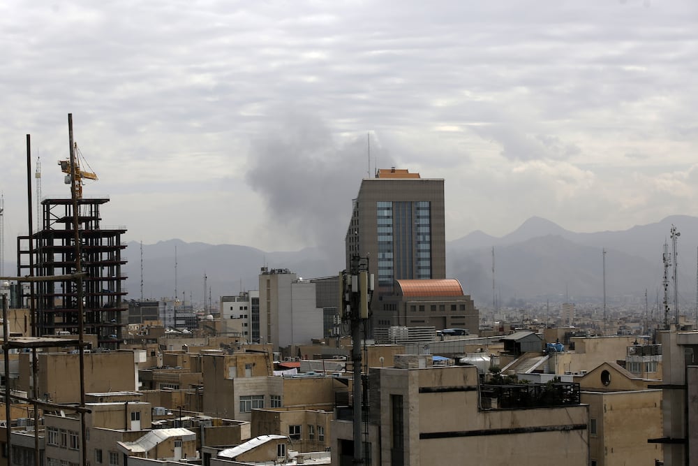TEHRAN, IRAN - MARCH 21: Smoke rise after powerful explosions as the Israeli army announced a new wave of attacks on Tehran, the capital of Iran, on March 21, 2026. (Photo by Fatemeh Bahrami/Anadolu via Getty Images)
