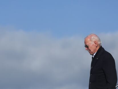 US President Joe Biden arrives at Moffett Field prior to surveying storm-damaged areas of California's central coast, in Mountain View, California.