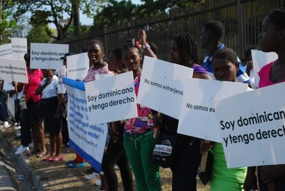 Dominicans of Haitian origin hold a protest over court's decision.