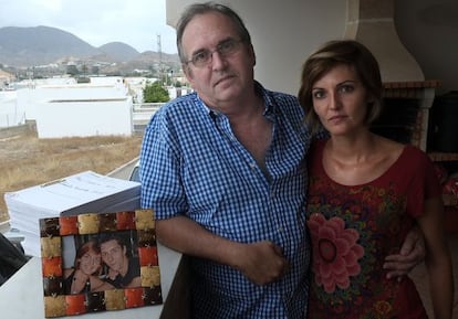 Joaquín Amills and his daughter alongside a photo and the case file of his missing son.