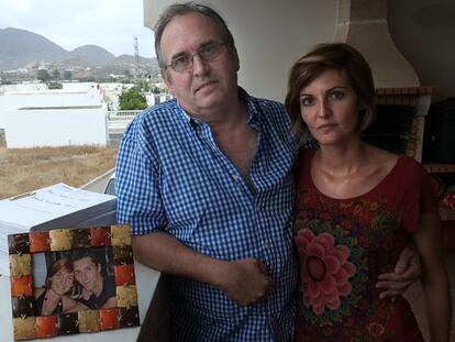 Joaquín Amills and his daughter alongside a photo and the case file of his missing son.