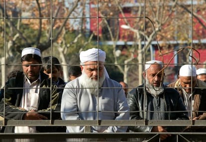 Muslims praying in a public square in Badalona before the town mayor announced it was to be forbidden.