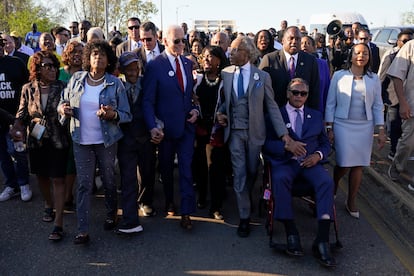 President Joe Biden talks with Rep. Terri Sewell, D-Ala., center, and the Rev. Al Sharpton after walking across the Edmund Pettus Bridge in Selma, Ala., Sunday, March 5, 2023, to commemorate the 58th anniversary of "Bloody Sunday," a landmark event of the civil rights movement. Sharpton holds hands with the Rev. Jesse Jackson at right. (AP Photo/Patrick Semansky)