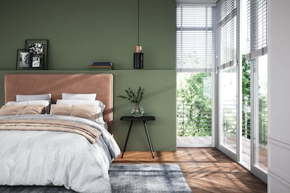 Modern bedroom interior with green wall.