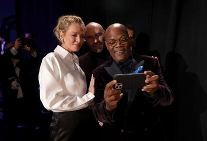 Los actores, desde la izquierda,Uma Thurman, John Travolta y Samuel L. Jackson se fotografían durante la gala.