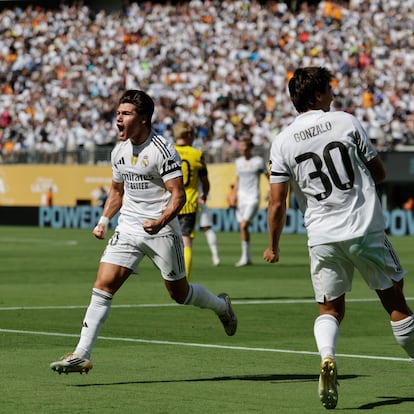 Real Madrid's Fran Garcia celebrates after scoring his side's second goal against Borussia Dortmund during the Club World Cup quarterfinal soccer match between Real Madrid and Borussia Dortmund in East Rutherford, N.J., Saturday, July 5, 2025. (AP Photo/Adam Hunger)