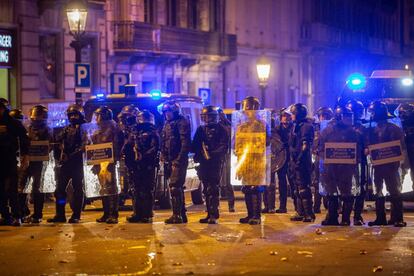 Police officers at street protests in Barcelona last month.