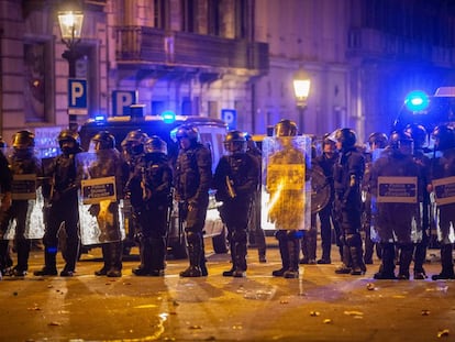 Police officers at street protests in Barcelona last month.