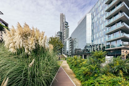 New modern buildings surrounded by green plants in Porta Nuova business district, Milan, Italy