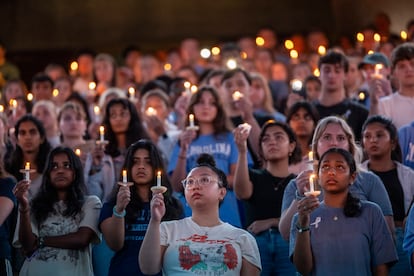 University of North Carolina-Chapel Hill students, faculty, and family hold a candlelight vigil, Aug 30, 2023, in Chapel Hill, N.C., in honor of professor Zijie Yan, who was killed on campus earlier that week.