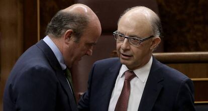 Luis de Guindos y Crist&oacute;bal Montoro.