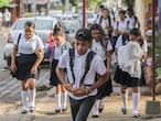 Students arrive to Rigoberto Lopez Perez public school, with very few wearing masks amid the spread of the new coronavirus, at the start of the school day in Managua, Nicaragua, Monday, April 27, 2020. (AP Photo/Alfredo Zuniga)