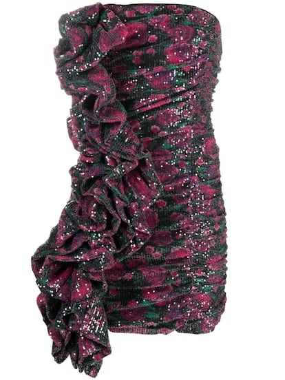 Las flores se combinan con las lentejuelas y los volantes en este vestido ‘micro’ con escote palabra de honor, que lleva el característico sello de Rotate Birger Christensen, la firma de Jeannette Madsen y Thora Valdimars. (En Farfetch, 380 €)